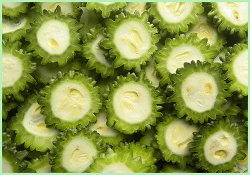 https://www.greendna.in/cdn/shop/products/bittergourdsliced_500x.webp?v=1670848361